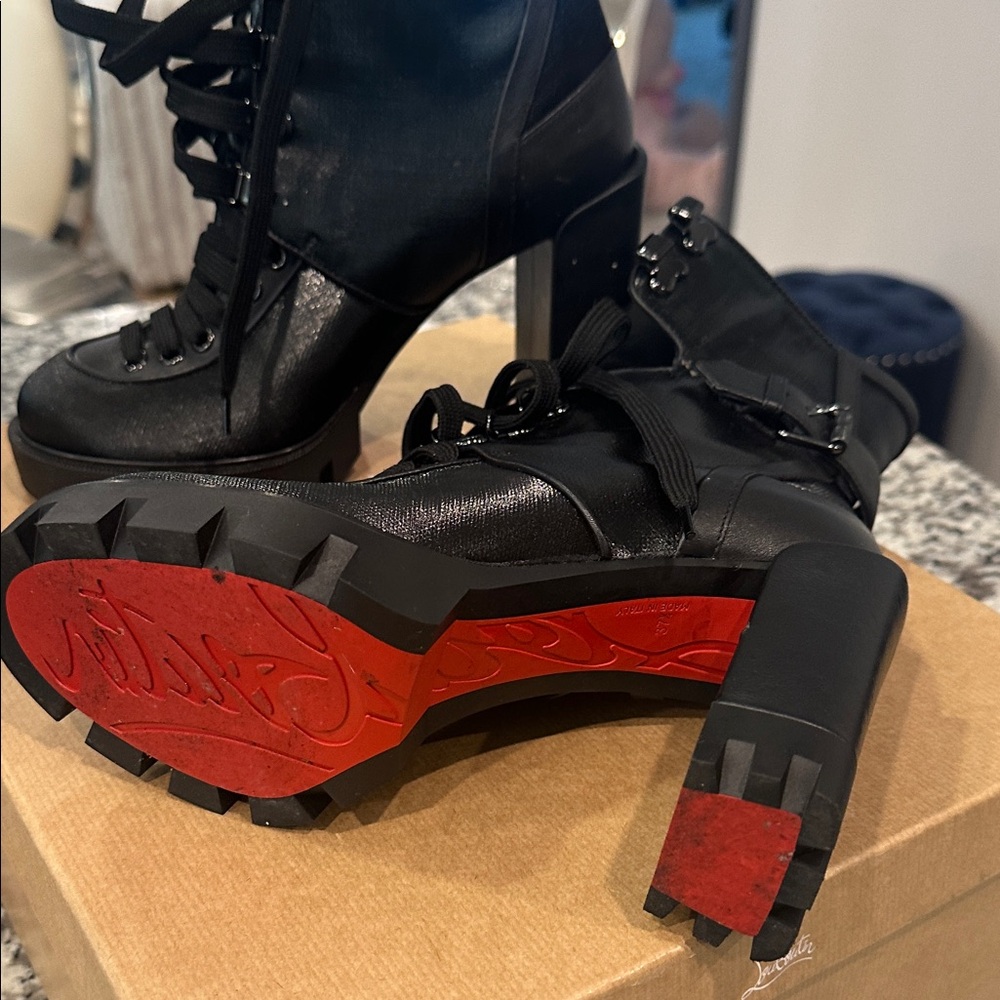 Christian Louboutin Black Heeled Boots with Signature Red Soles